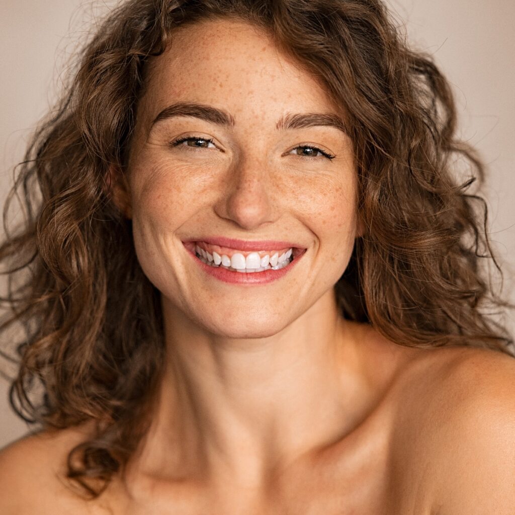 Beauty joyful young woman looking at camera jpg